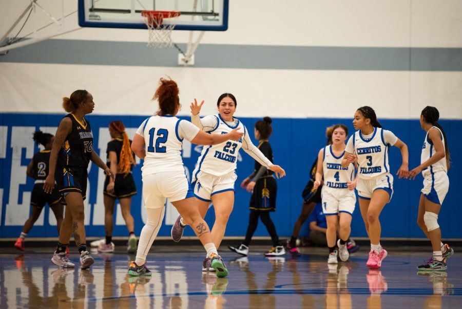 Sophomore Brianna Flores (No. 23), Guard/Forward, celebrates with her Falcons teammates during the Los Angeles Harbor game at Feb. 10. Photo credit: Claudia Santos