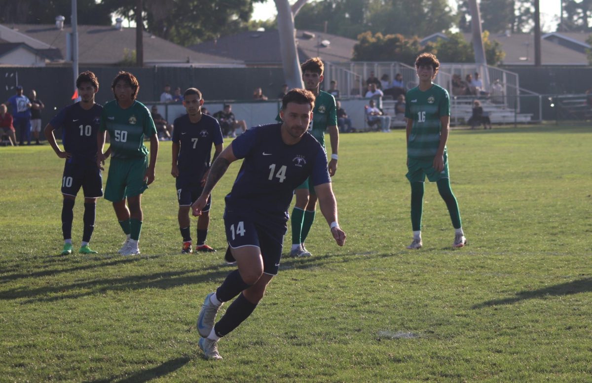 Erick Velasco celebrating after scoring a penalty 