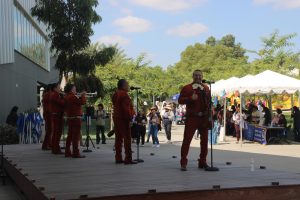 A mariachi ensemble playing music on the stage to the side of the Performing Arts Center for those attending the La Feria Latina event hosted by the Student Programming Board on Sept. 18.