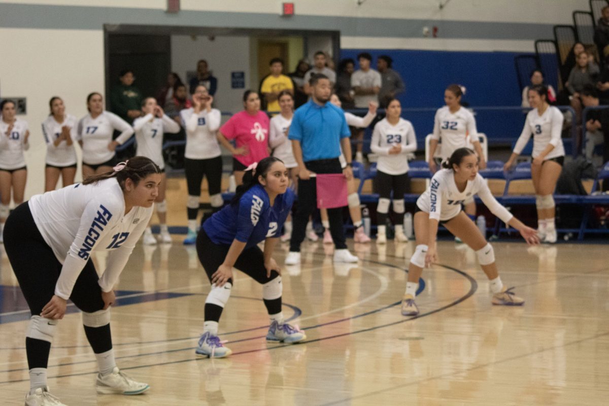 Monserrat Rodriguez (left) Priscilla Castillo (in blue) Jasmine Soto-Castro (far right) getting ready for the next set