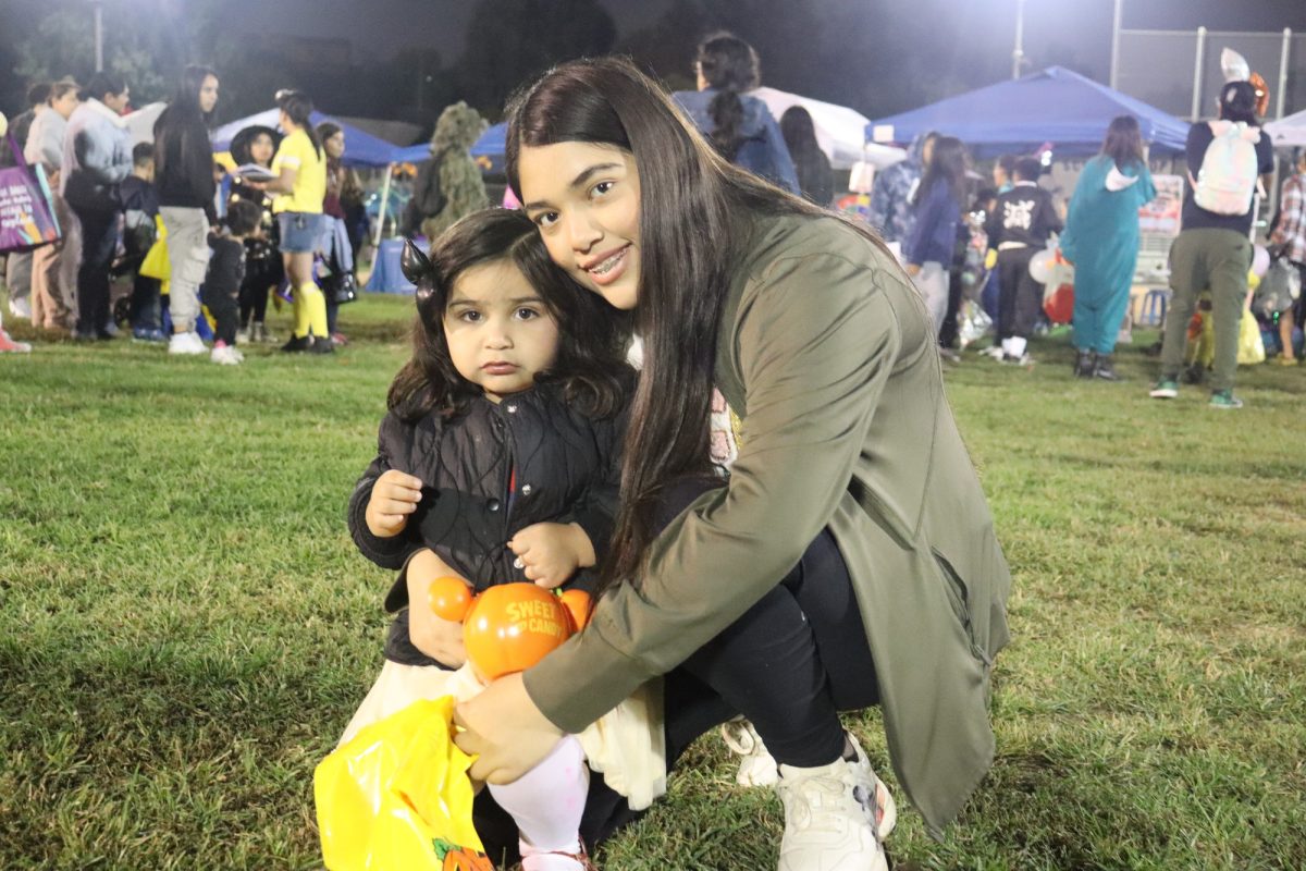 Isabel Jimenez who brought her little sister to the event. Photo credit: Alejandra Guerra