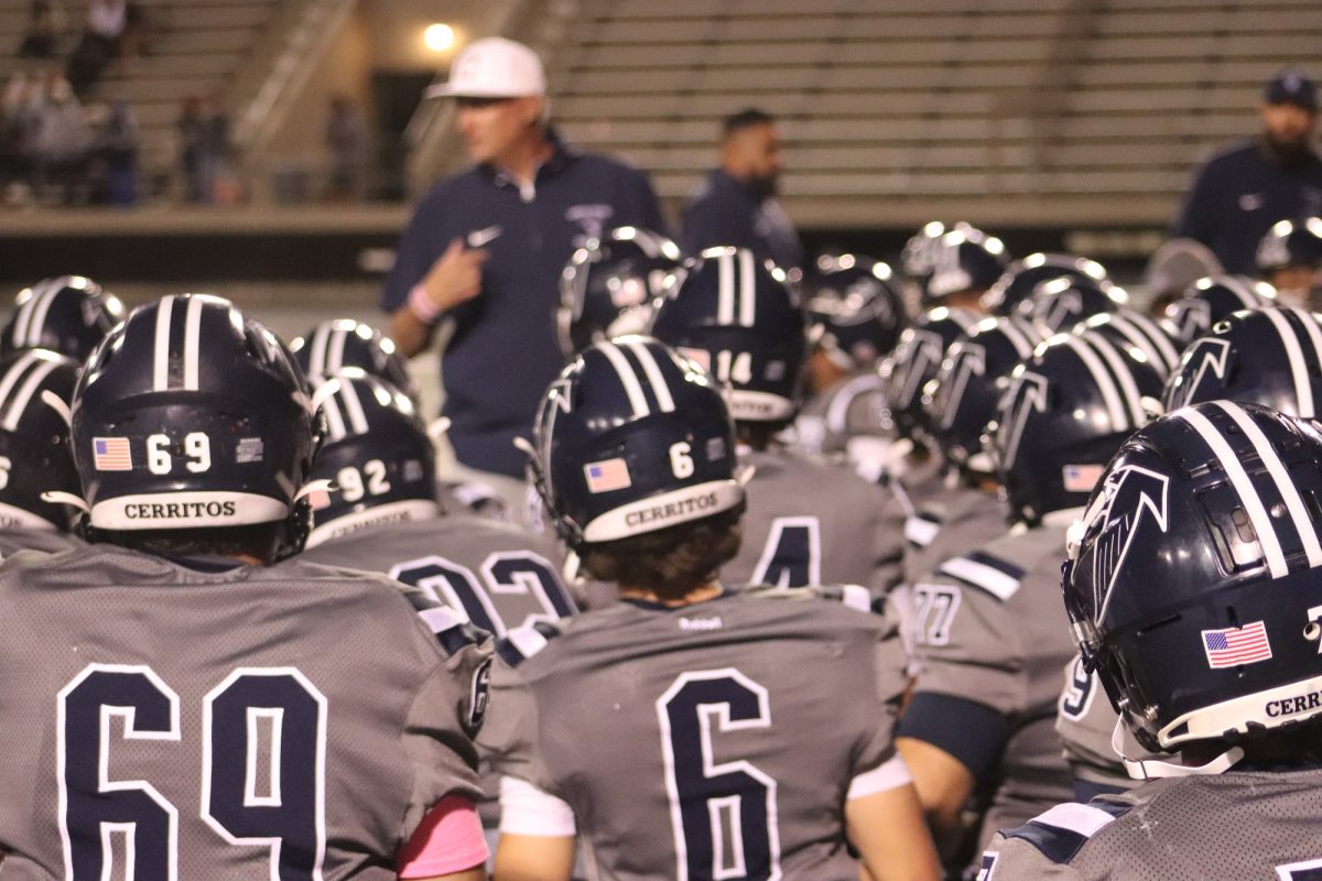 Falcons kneeling during Coach Dean Grosfelds post game speech after game against Mt. Sac on Oct. 21. Photo credit: Jonathan Diaz