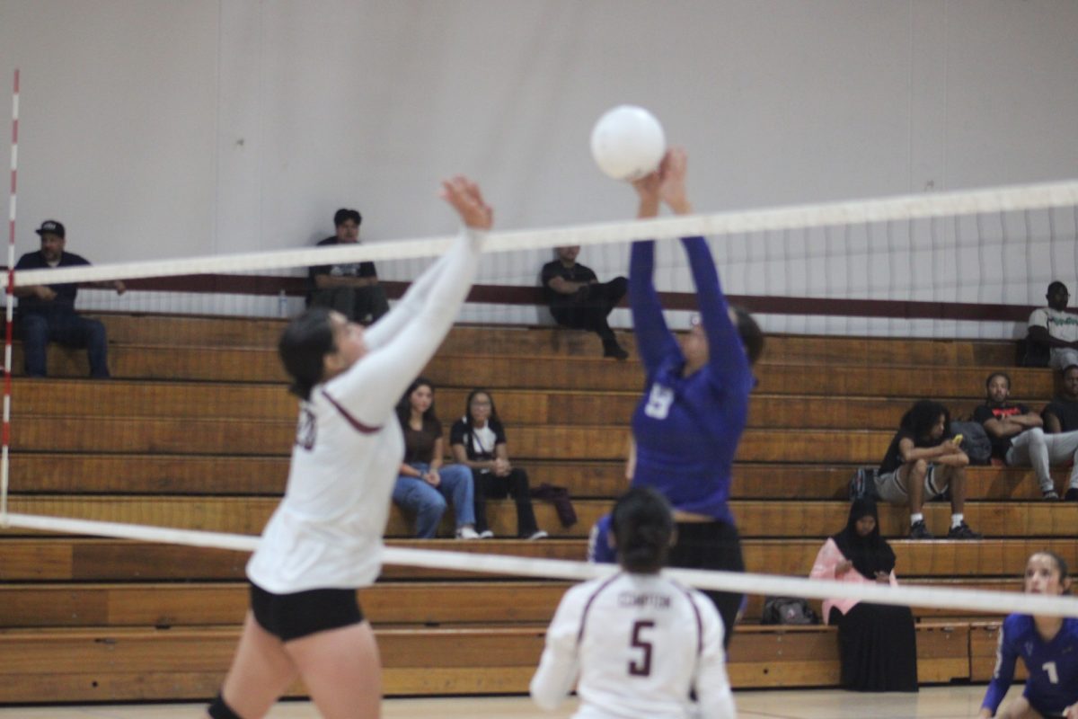 Middle Blocker Josie Navarro going for a kill against the Compton Tartars Oct. 11. Photo credit: Jonathan Diaz