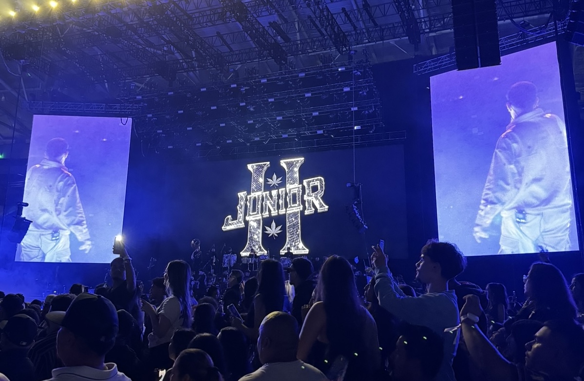 Fans stood on the chairs to be able to see Junior H performing on the stage. Photo credit: Natalie Gonzalez