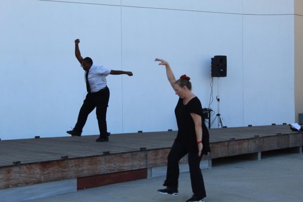 Dance instructor teaching the moves at the 'Wednesday' dance workshop Oct.22