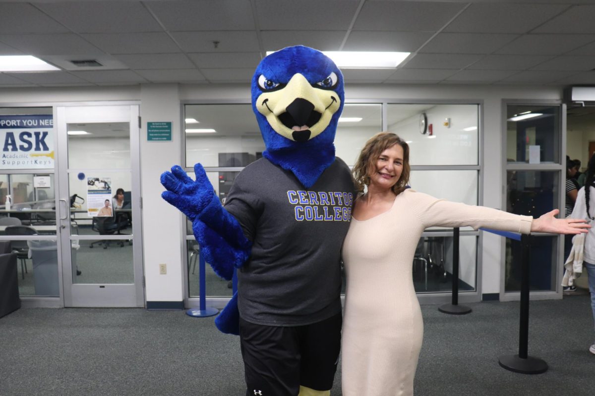 Franco Falcon, Cerritos College's mascot, and Shawna Baskette at the success center's open house on Sept. 24 in the success center. Photo credit: Isaac Cordon