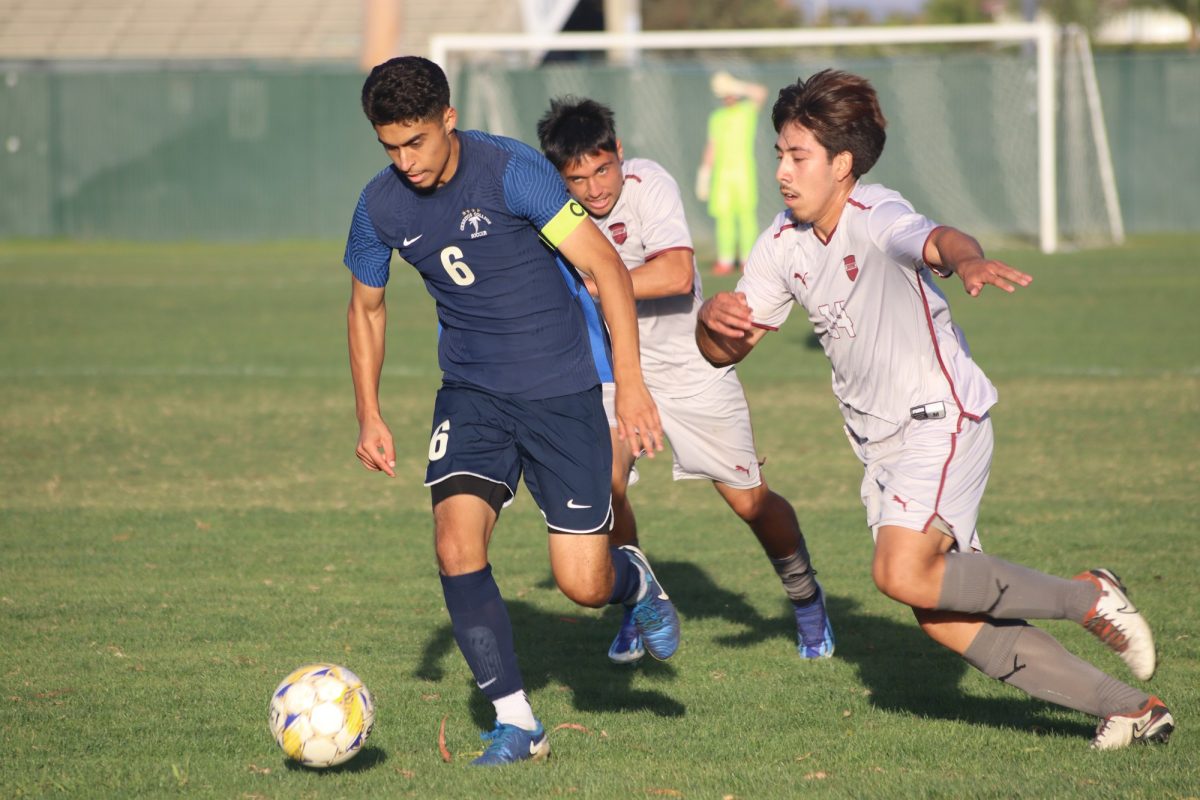 #6 Adrian Ibarra controlling the ball 