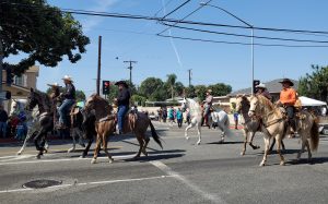 People riding horses at the 39th Annual Arturo Sanchez Halloween Parade in Norwalk on Oct. 12 along Norwalk Boulevard. 