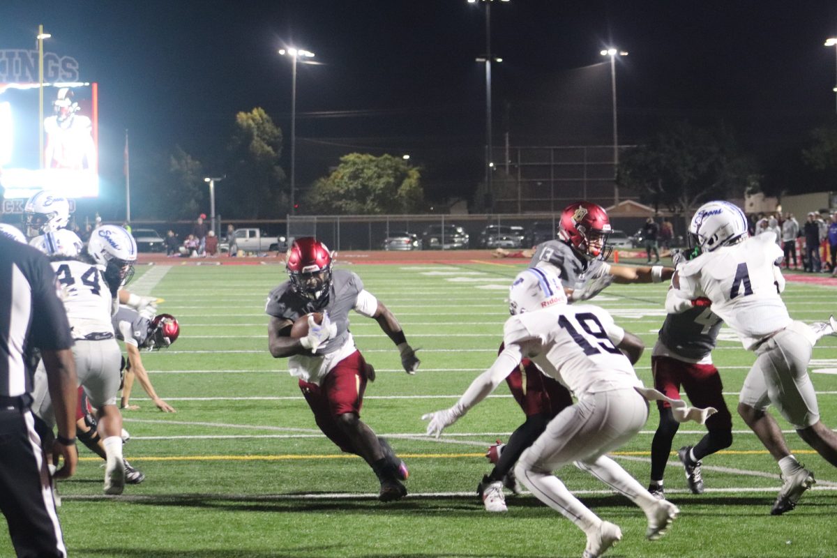 Senior running back/middle linebacker Bernardo Blanco rushing in for the first touchdown in the game aganist the Mayfair Monsoons on November 1 