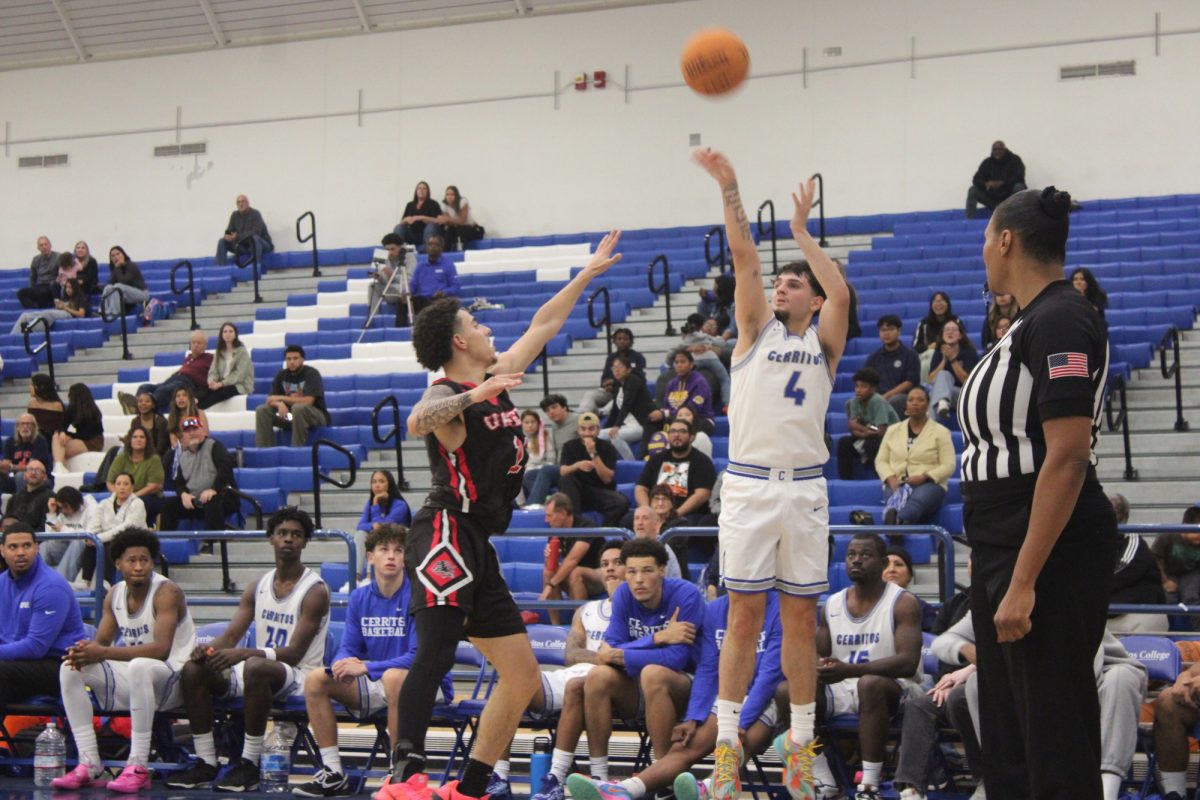 #4 Brian Demedio shooting the ball Nov. 2 Photo credit: Peyton Oliveira