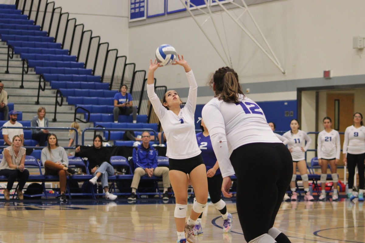 Leeya Rubio setting the ball in matchup against El Camino on Nov. 1 Photo credit: Michael Delgado