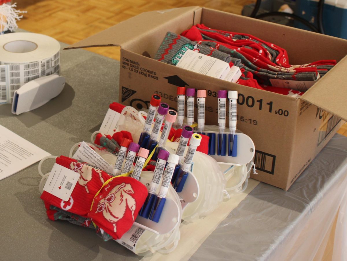 Donors blood tubes stored together as well as "Friends" branded stockings in collaboration with the American Red Cross on Nov. 20, 2024. Photo credit: Dayanara Arroyo