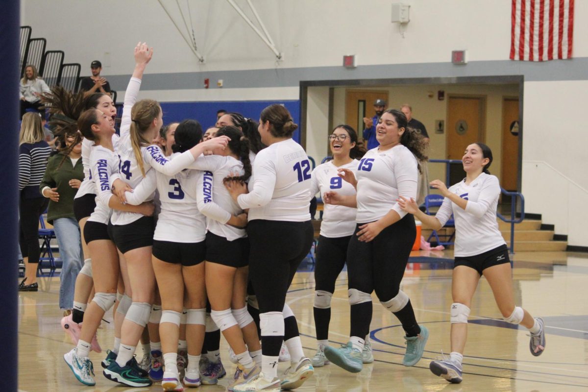 Cerritos College volleyball team celebrating their win over San Bernardino Valley in the third round of the Southern California Regional Playoffs on Nov. 30, 2024. Photo credit: Isaac Cordon