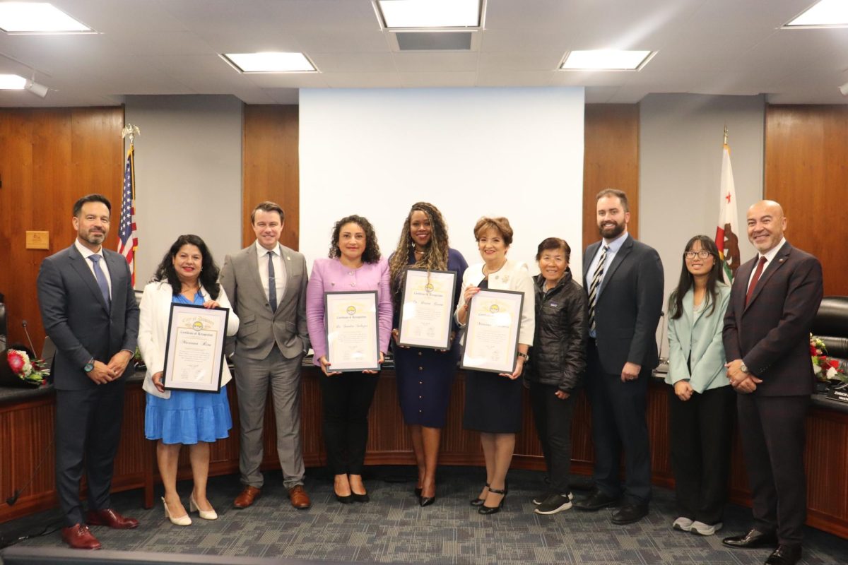 (From Left to Right) Dr. Jose Fierro, Mariana Rios, James Cody Birkey, Sandra Salazar, Dawn Green, Mariana Pacheco, Shin Liu, Zurich Lewis, Cathy Le, and city of Downey mayor Mario Trujillo recognizing honorees after the swearing in ceremony at the Board of Trustees meeting on Dec. 11 at the Cheryl A. Epple Board Room at Cerritos College. Photo credit: Jasmine Reyes