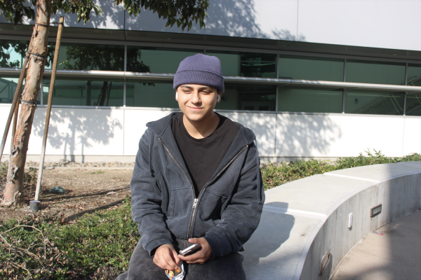 Cerritos College student, Ethan Rios (he/him), talks about the effects social media has in politics outside the art building at Cerritos College on Jan. 27, 2025. (<a href="https://www.talonmarks.com/staff_profile/felix-palencia/">Felix Palencia</a>)