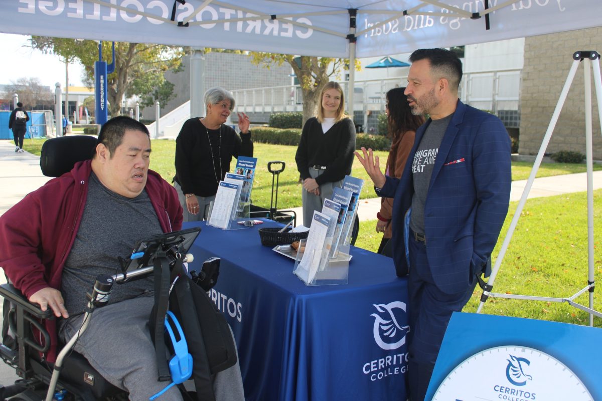 President Fierro talks to student about C10 parking lot outside of Cerritos College Library with Cheryl Thury, Catherine Lu and Chelsea Van Doornum on Feb. 18, 2025.