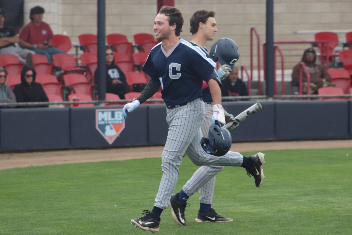 Falcons designated hitter, Brody Cuellar, headed to the dugout to celebrate his two-run home run during the Cerritos College vs. Compton baseball game on March 1, 2025.