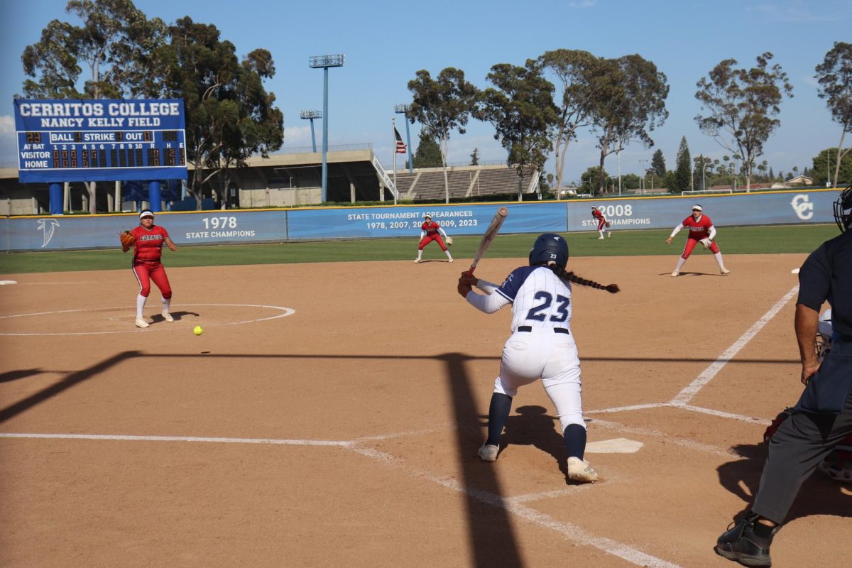 Vicky Najera hits a ground ball during the Cerritos vs Compton game on April 21, 2025.