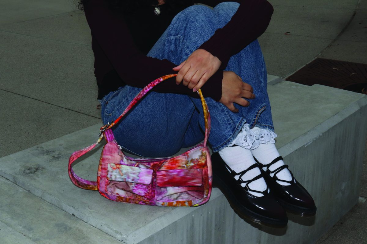 The BAGGU x Collina Strada cargo shoulder bag in the color Berry Chrysanthemum.